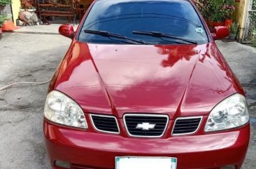 Red Chevrolet Optra 2004 for sale in Manual