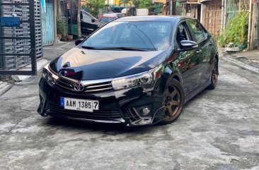 Selling Black Toyota Corolla altis 2014 in Quezon City