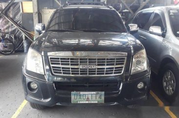 Selling Black Isuzu Alterra 2013 in Quezon City