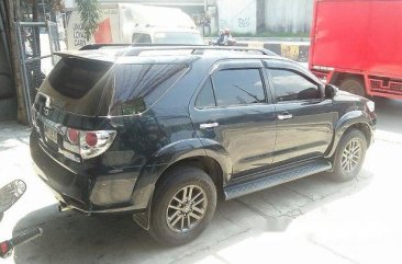 Selling Black Toyota Fortuner 2014 at 80000 km