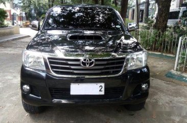 Black Toyota Hilux 2014 for sale in Quezon City 