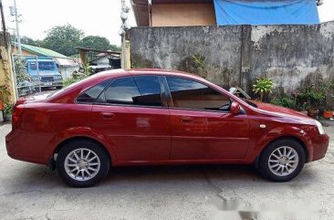 Sell Red 2004 Chevrolet Optra Manual Gasoline 