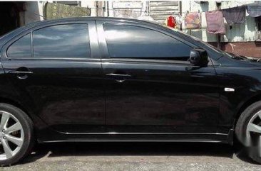 Black Mitsubishi Lancer Ex 2014 at 76000 km for sale 