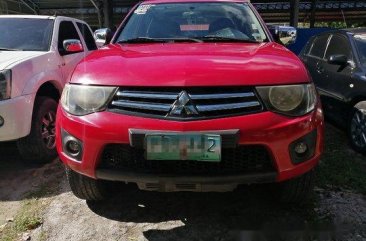 Red Mitsubishi Strada 2011 at 67000 km for sale 