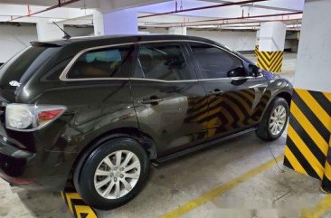 Black Mazda Cx-7 2011 at 60000 km for sale 