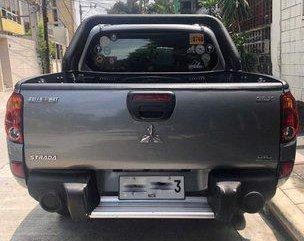 Sell Grey 2014 Mitsubishi Strada in Pasig