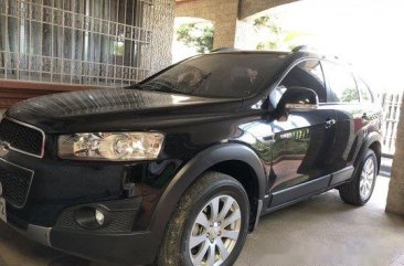 Selling Black Chevrolet Captiva 2014 at 24800 km