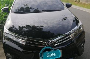 Selling Black Toyota Corolla Altis 2015 at 60000 km