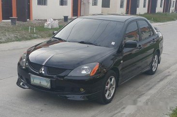 Black Mitsubishi Lancer 2005 for sale in Dasmarinas 