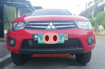 Sell Red 2013 Mitsubishi Strada in Quezon City 