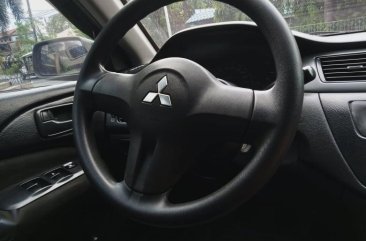 Sell Grey 2009 Mitsubishi Lancer in Quezon City