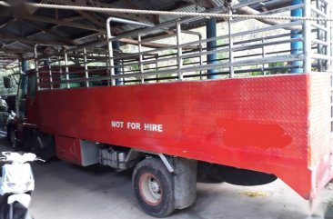 Selling Purple Isuzu Elf 2016 in Dumanjug