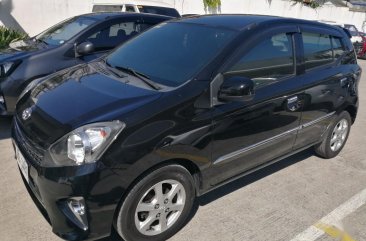 Selling Black Toyota Wigo 2015 in Manila