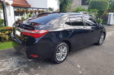 Selling Black Toyota Corolla altis 2015 in Quezon City