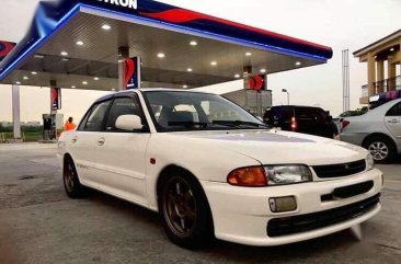 Sell White 1993 Mitsubishi Lancer in Pateros