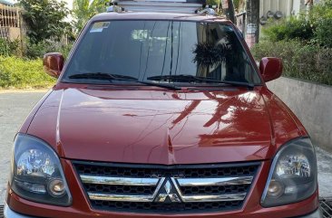 Red Mitsubishi Adventure 2012 for sale in Manual