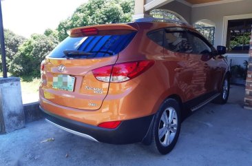 Selling Orange Hyundai Tucson 2013 in San Pascual