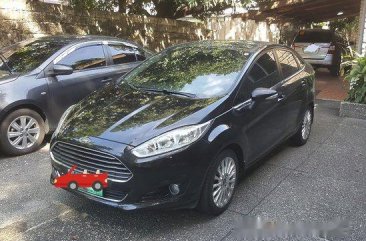 Black Ford Fiesta 2014 at 64000 km for sale 