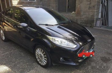 Black Ford Fiesta 2014 at 64000 km for sale 