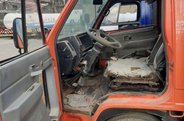 Orange Isuzu Elf 1998 for sale in Manual