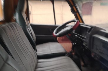 Yellow Isuzu Elf 1991 for sale in Manila