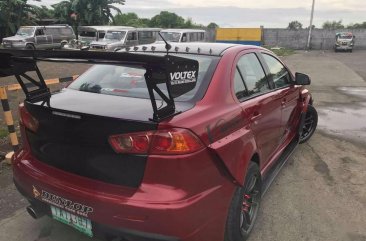 Red Mitsubishi Lancer 2010 for sale in Manila