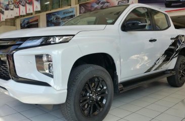 Sell White 2020 Mitsubishi Strada in Quezon City