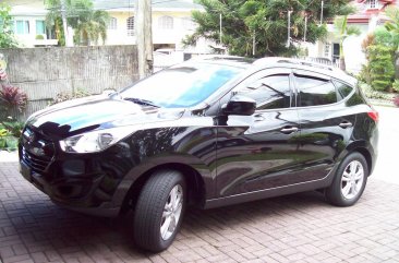 Selling Black Hyundai Tucson 2012 SUV / MPV in Quezon City