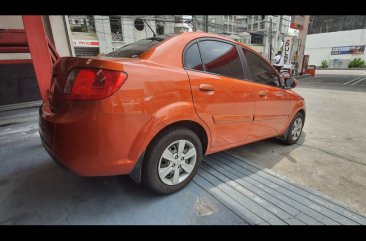 Selling Orange Kia Rio 2010 Sedan in Manila