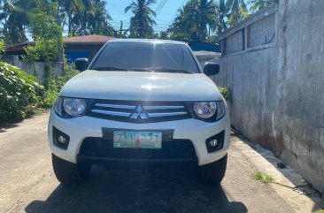 Sell White Mitsubishi Strada in Lipa