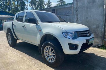 Sell White Mitsubishi Strada in Lipa