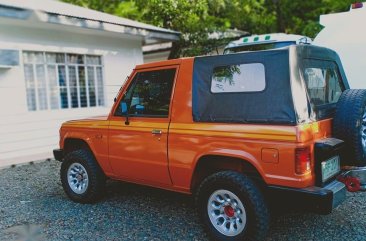 Selling Orange Mitsubishi Pajero for sale in Bustos