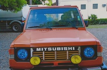 Selling Orange Mitsubishi Pajero for sale in Bustos