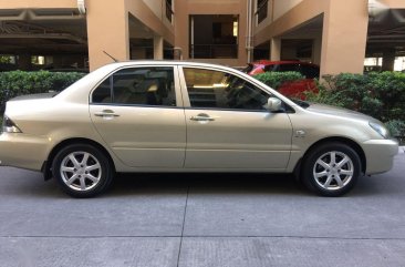 Selling Beige Mitsubishi Lancer for sale in Manila