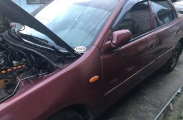 Sell Purple Mazda Familia in Caloocan