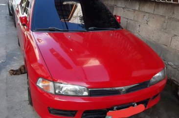 Sell Red Mitsubishi Lancer in Manila