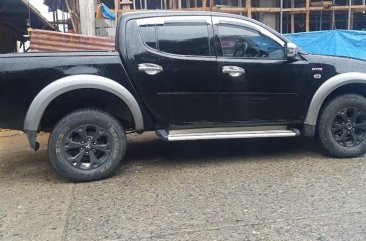 Black Mitsubishi Strada 2013 for sale in Baguio City