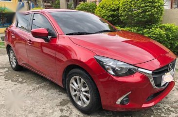 Red Mazda 2 for sale in Pacita Complex