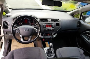 Sell White Kia Rio in Quezon City