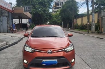Sell Orange Toyota Vios in Quezon City