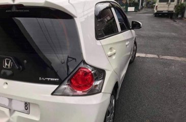 Selling White Honda Brio in Cainta