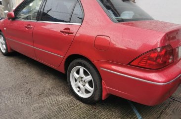 Sell Red Mitsubishi Lancer in Quezon City