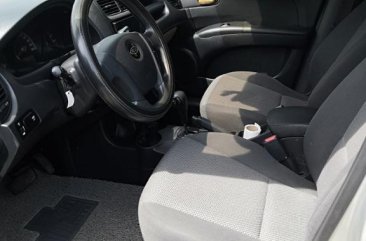 Sell Silver Kia Sportage in Muñoz