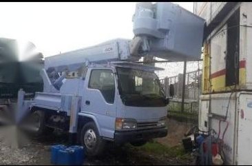 Selling White Isuzu Elf in Quezon City