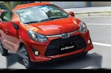 Orange Toyota Wigo for sale in Quezon City