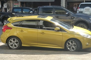 Selling Yellow Ford Focus in San Jose