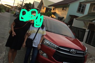 Selling Red Toyota Innova in Manila