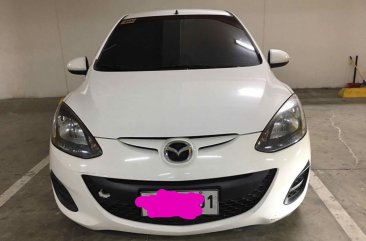 Selling White Mazda 2 in Manila