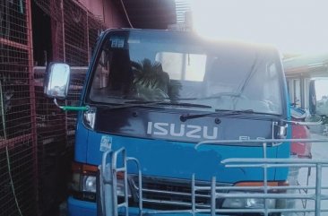 Blue Isuzu Elf for sale in Morong