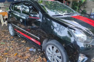 Selling Black Toyota Wigo 2014 in Cabuyao